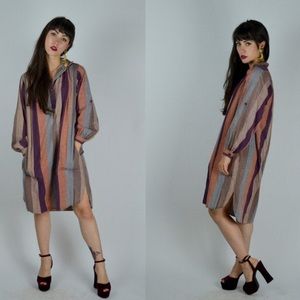 Gorgeous 1970s Indian cotton tunic!
Done in a sandy array of earthy cool colors